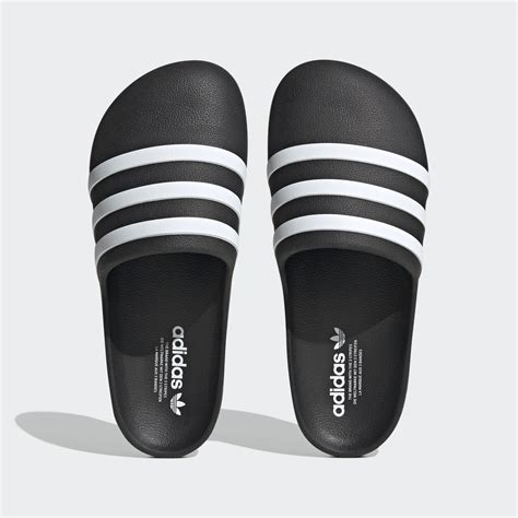 original adidas slides price|Adidas adilette slides all black.